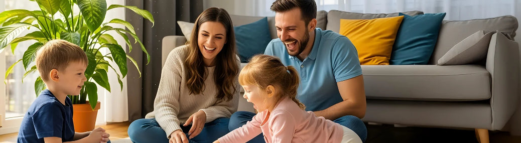 Family playing a board game together in a living room
